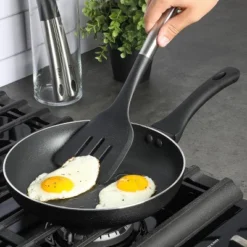 Oster® Oster Baldwyn 13.5 Inch Nylon Slotted Turner In Black -Target KitchenAid GUEST 19f3c4d8 23ea 4fb7 949f 83babf593dfb